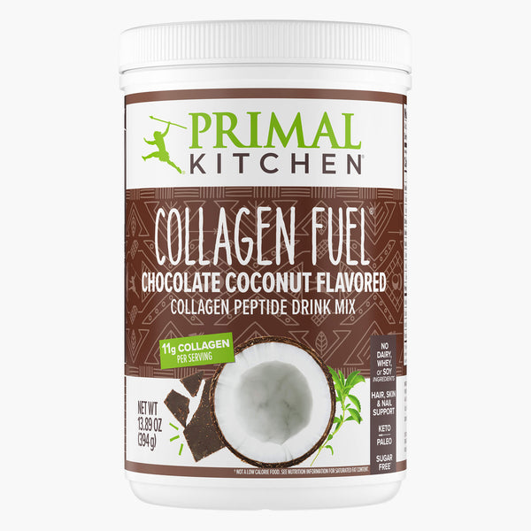 A white canister of Primal Kitchen Collagen Fuel Chocolate Coconut Flavored Collagen Peptide Drink Mix.