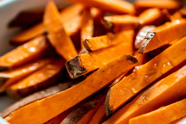 Closeup on a tray of air fryer sweet potato fries.