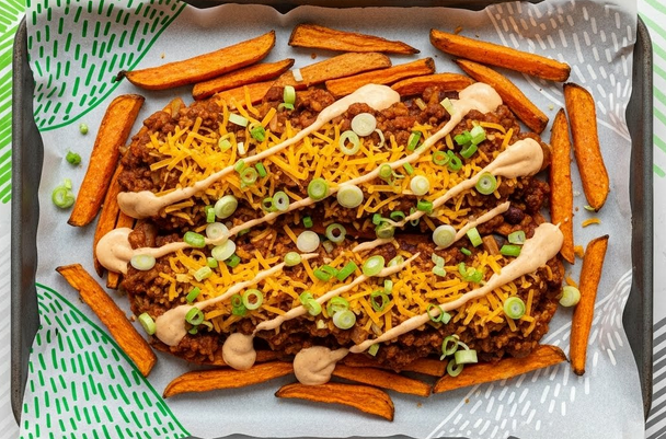 Sweet Potato Chili Fries in an individual cast iron skillet.