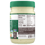 Nutrition label of a glass jar with a green lid of Primal Kitchen Pesto Mayo made with Avocado Oil.