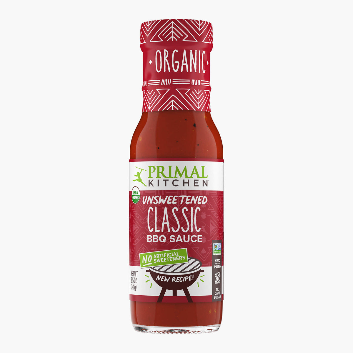 Bottle of Primal Kitchen Organic Unsweetened Classic BBQ Sauce with no artificial sweeteners on a white background