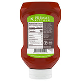 Backside of Primal Kitchen Unsweetened Squeeze Ketchup bottle showing nutrition facts and ingredients list