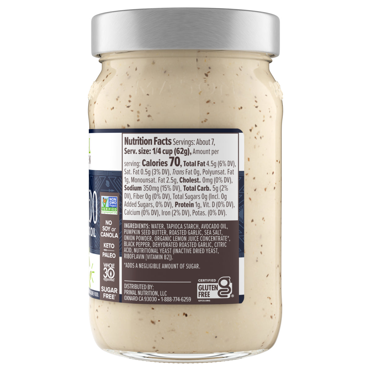 Front of a jar of vegan no-dairy Primal Kitchen Garlic Alfredo Sauce including nutrition facts and ingredient list of pasta sauce, on a light grey background.