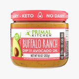 A jar of Primal Kitchen Buffalo Ranch Dip made with Avocado Oil with a red label, on a light grey background.
