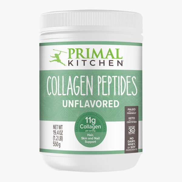 A canister of Primal Kitchen Unflavored Collagen Peptides drink mix with a green and white label on a light grey background.