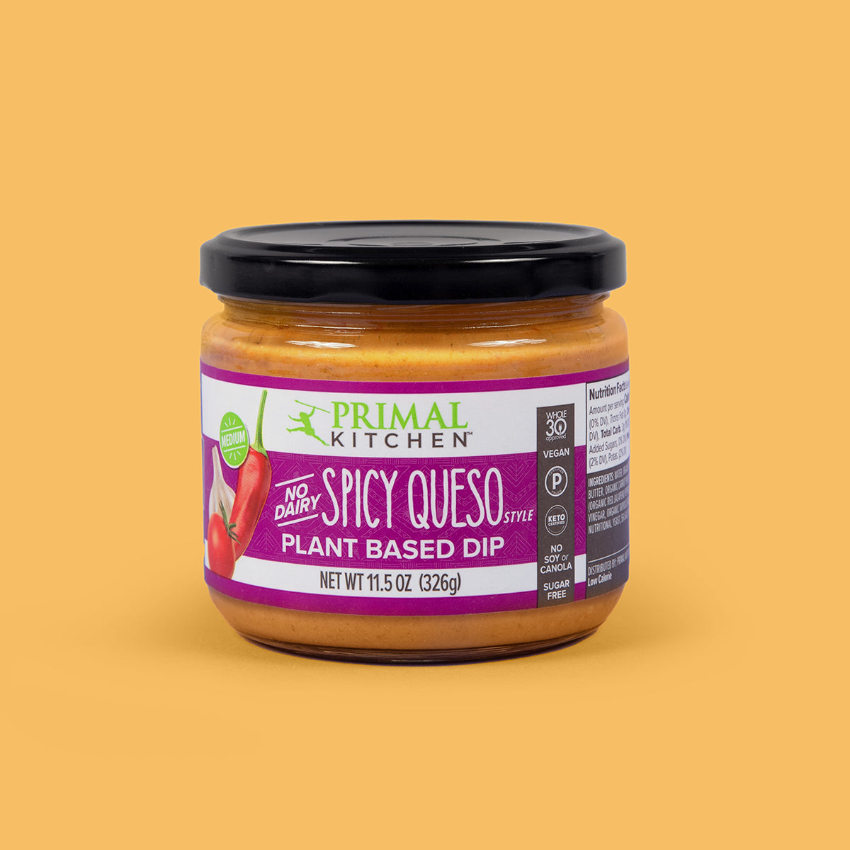 A jar of Primal Kitchen Vegan No Dairy Spicy Queso Style Plant Based Dip with a dark purple label on an orange background.