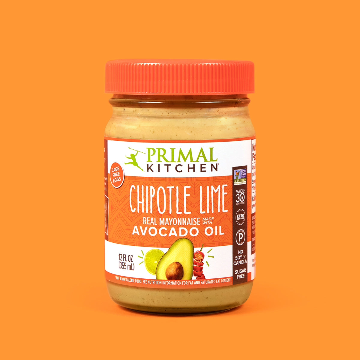 A jar of Primal Kitchen Chipotle Lime Mayo made with Avocado Oil with an orange label and lid on an orange background.