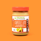 A jar of Primal Kitchen Chipotle Lime Mayo made with Avocado Oil with an orange label and lid on an orange background.