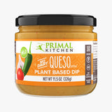 A jar of mild no-dairy Primal Kitchen Queso Style Plant Based Dip with an orange label on a light grey background.